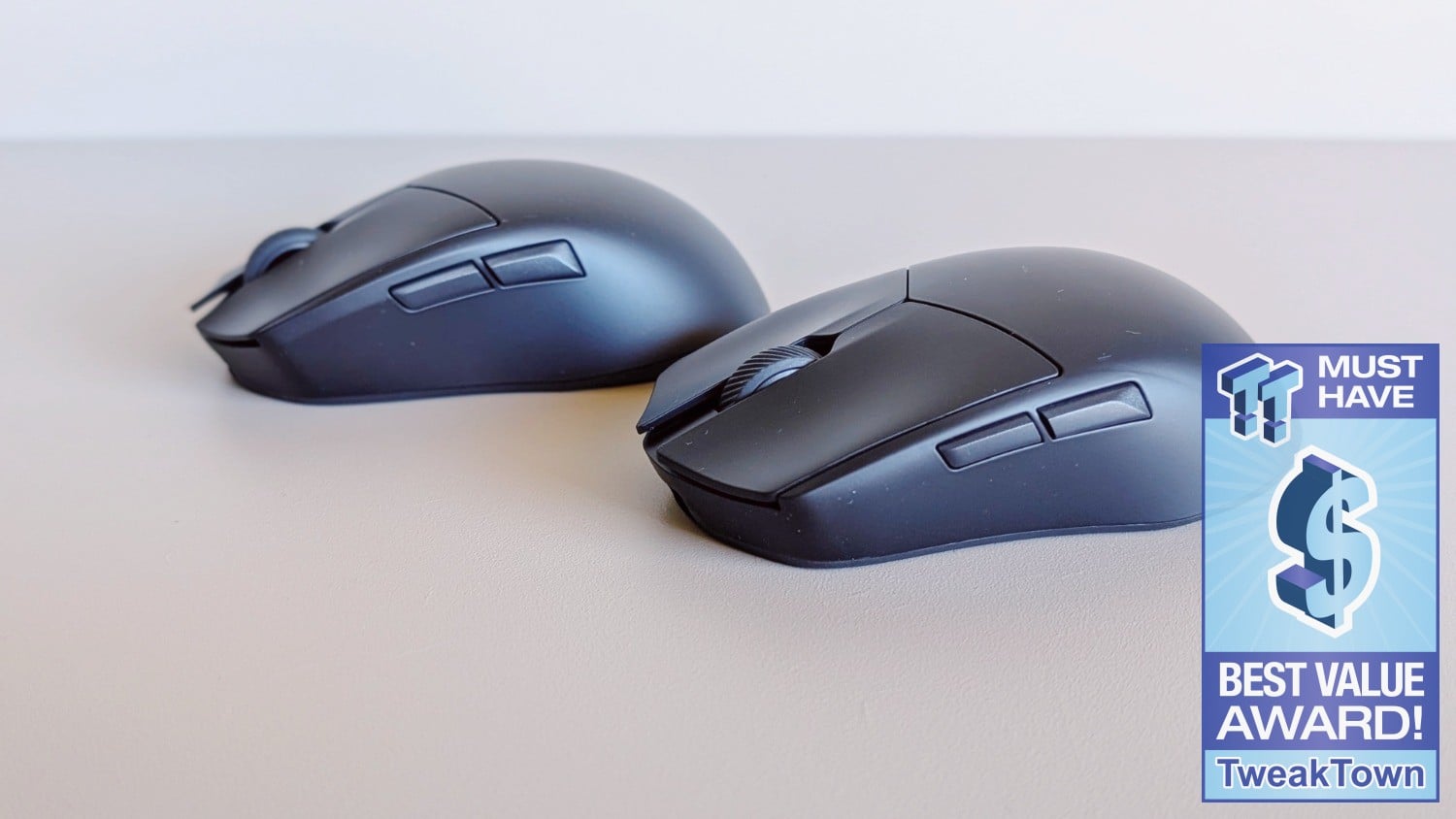 Two black be quiet! Dark Perk wireless gaming mice sit side by side, showing their different shapes and side buttons.