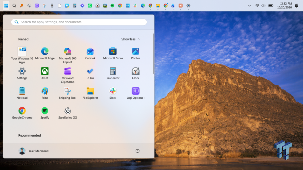Windows 11 ಡೆಸ್ಕ್ಟಾಪ್ ಮೇಲಿನ ಅಂಚಿನಲ್ಲಿ ಟಾಸ್ಕ್ ಬಾರ್ ಮತ್ತು ಅದರ ಕೆಳಗೆ ಸ್ಟಾರ್ಟ್ ಮೆನು ತೆರೆಯುತ್ತದೆ.