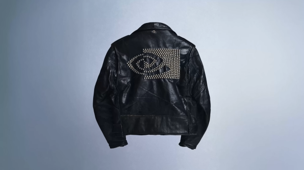 NVIDIA CEO Jensen Huang given a new leather jacket by a humanoid robot from 1X Technologies 505