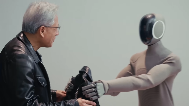 NVIDIA CEO Jensen Huang given a new leather jacket by a humanoid robot from 1X Technologies 506