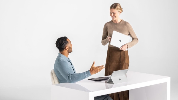 Happy people using Surface devices yesterday (Image Credit: Microsoft)
