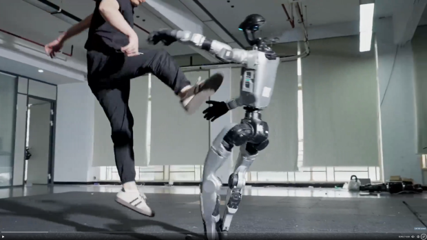 Open enlarged image Engineers demonstrate how to spartan kick their humanoid robot