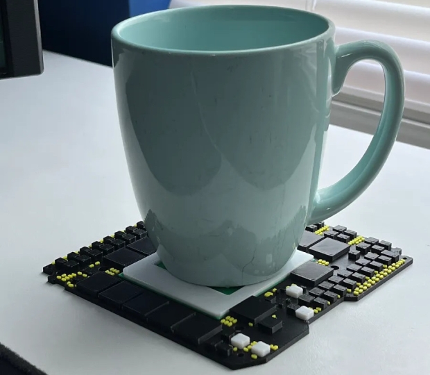 A 3D printer project for a coaster which is an authentic replica of the main PCB from the RTX 5090 (Image Credit: jq910)