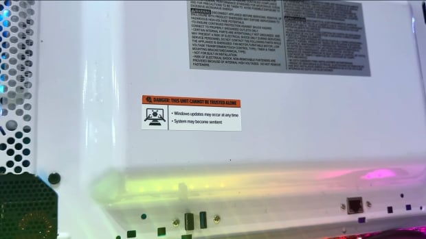 This microwave was modded into a gaming PC: rotates on a turntable, Stream Deck for keypad 704