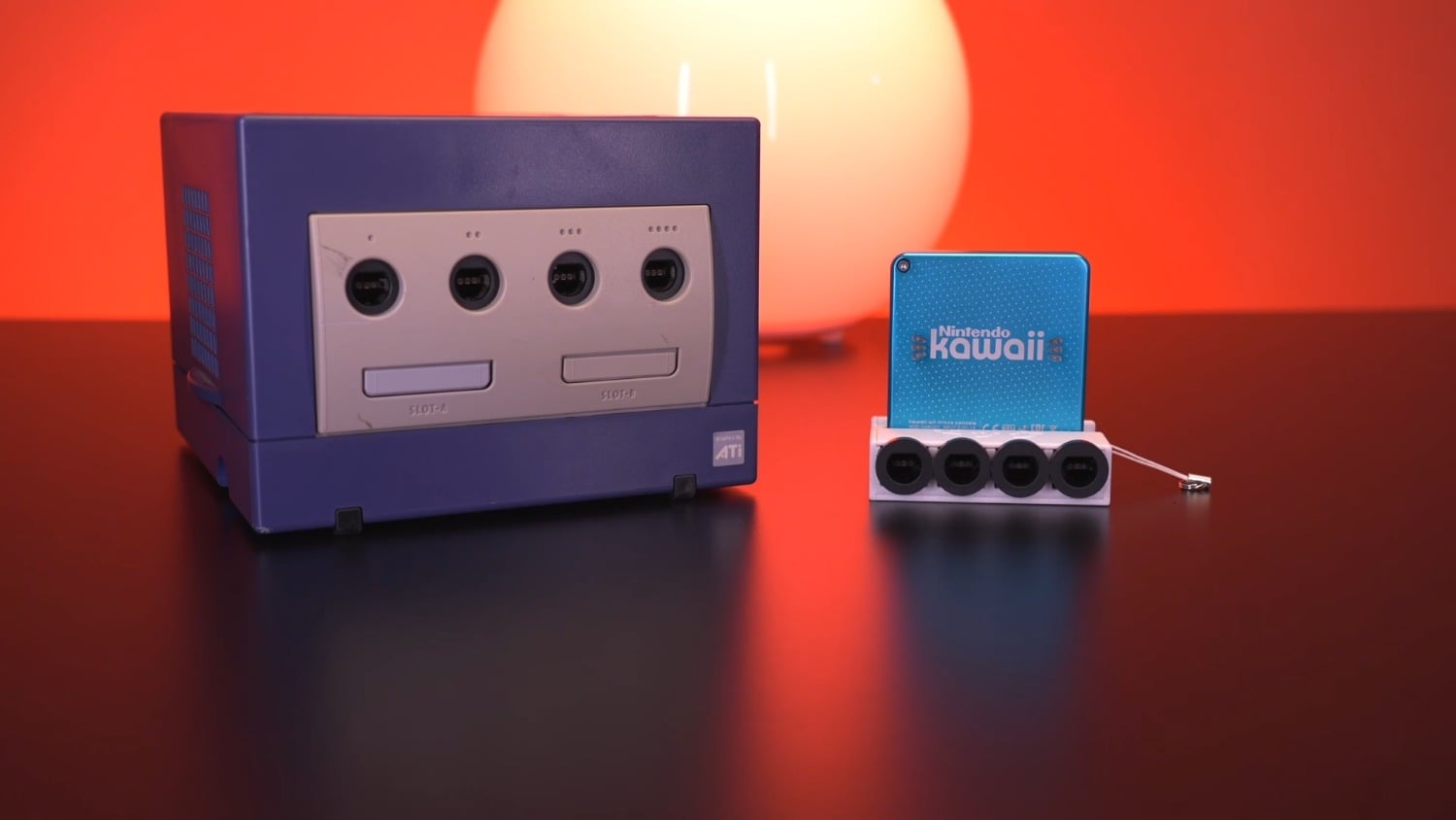 Nintendo GameCube shrunk down to the size of a keychain, includes actual hardware
