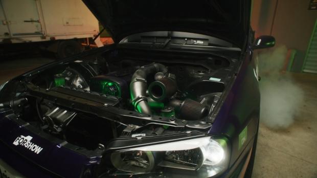 No, that's not a 1998 Nissan Skyline R34 GTT engine, it's a RTX 5090 gaming PC, image credit: modifiedgg/NVIDIA.
