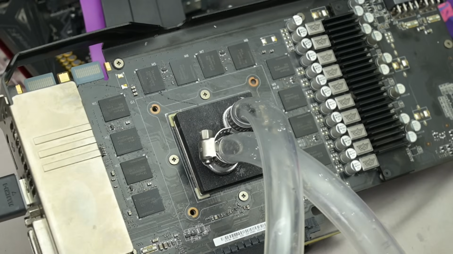 Benchmarks show direct water on die cooling with no heat spreader outperforms AIO liquid cooling on a GPU