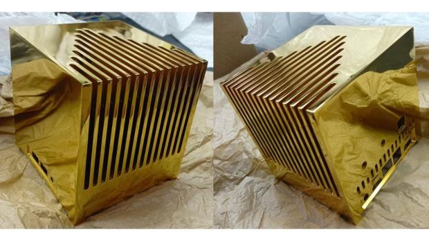 A custom Kubb Fanless mini PC built with a solid gold chassis, image credit: FanlessTech.