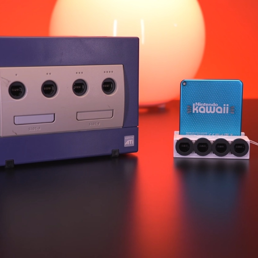 Nintendo GameCube shrunk down to the size of a keychain, includes
