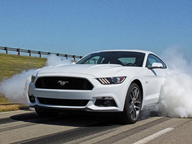 Open enlarged image Ford shows off 2015 Mustang GT line lock feature | TweakTown.com