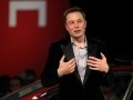 Elon Musk warns of AI again, says it's like Elon Musk warns of AI again, says it's like