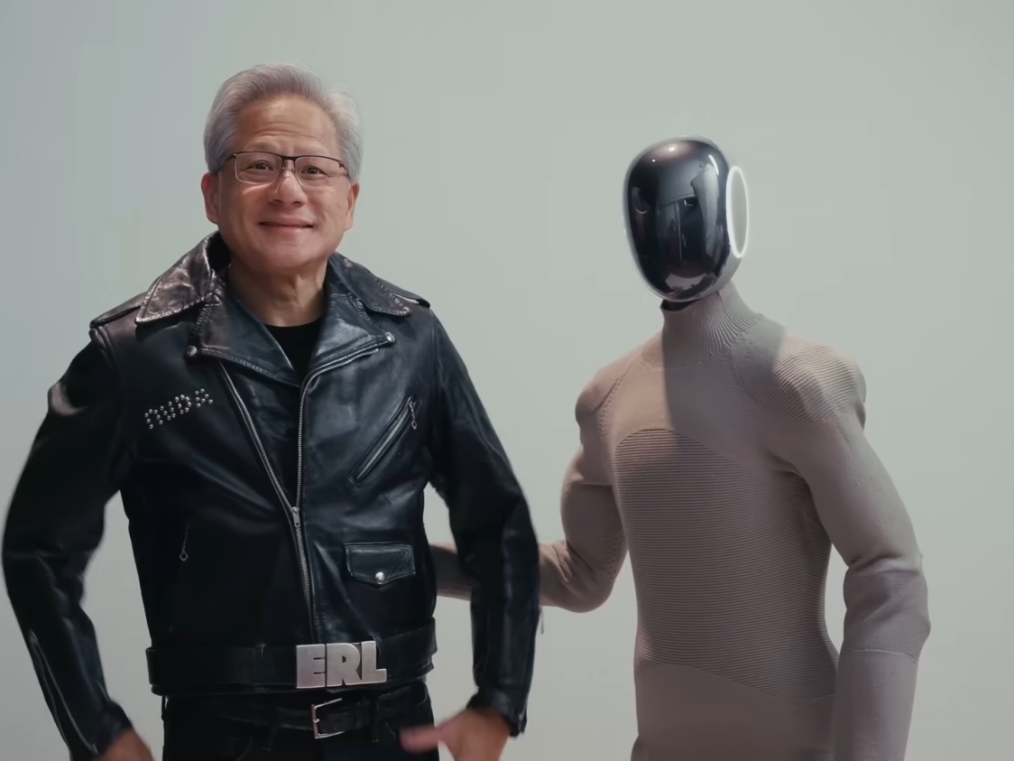 NVIDIA CEO Jensen Huang given a new leather jacket by a humanoid