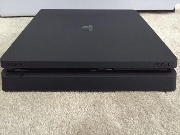 Sony's new PS4 Slim smiles for the camera Sony's new PS4 Slim smiles for the camera