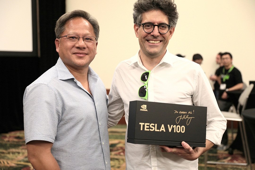 NVIDIA CEO hands out first Tesla V100s to AI researchers