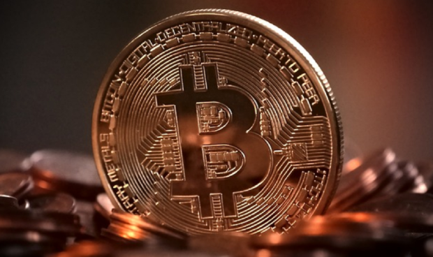 Le plus grand échange de crypto-monnaie au monde fait l'objet d'une enquête par SEC 01 |  TweakTown.com