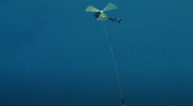 Open enlarged image A helicopter will attempt to catch a falling rocket booster very soon