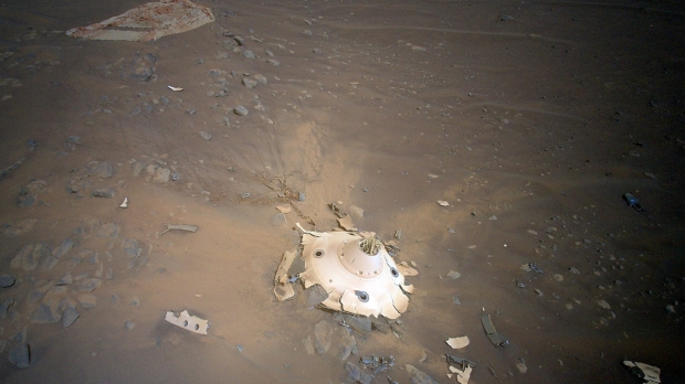 Open enlarged image NASA's helicopter on Mars flies over landing gear wreckage