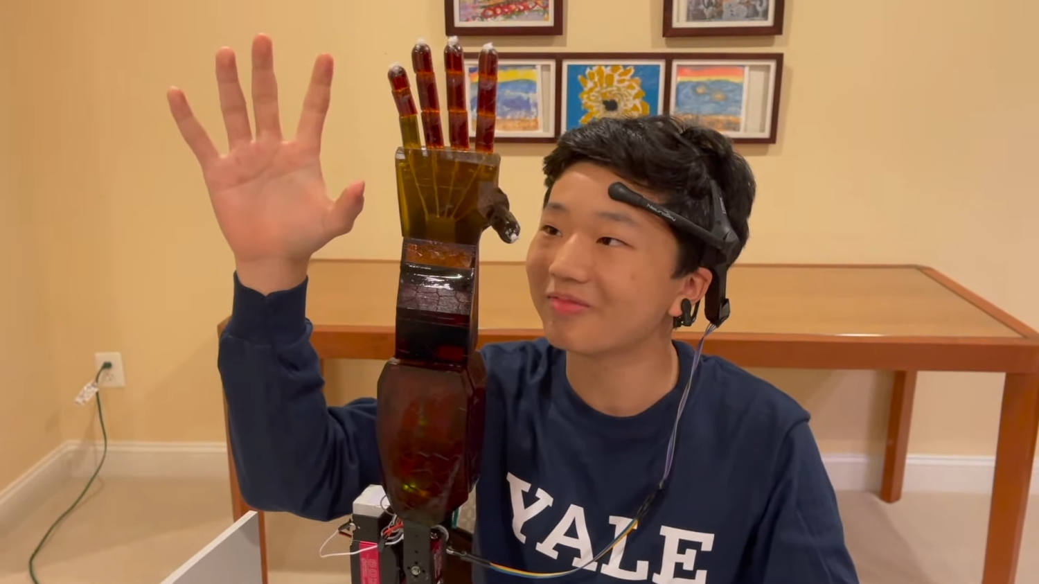 This mind-controlled prosthetic arm was built by a high school student