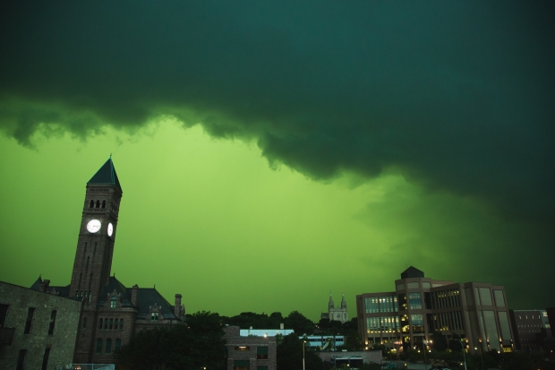 Open enlarged image Strange storm changes the color of the sky to an apocalyptic green