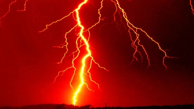 Rare red lightning spotted shooting over desert