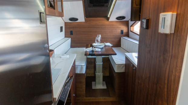  27North did the most they could with the limited space available in the camper. Everything is based on efficiency - the rear dinette converts into a double bed (Image Courtesy of: MotorTrend)