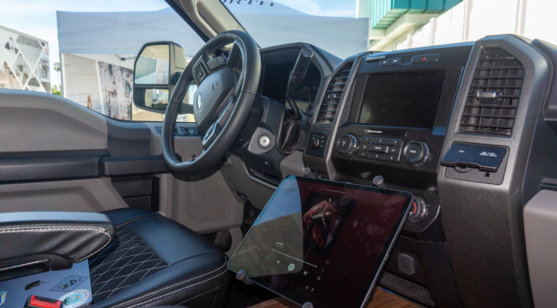 The 30A includes an iPad Pro 12.9" to have tech access and control features in the truck. (Image Courtesy of: MotorTrend)