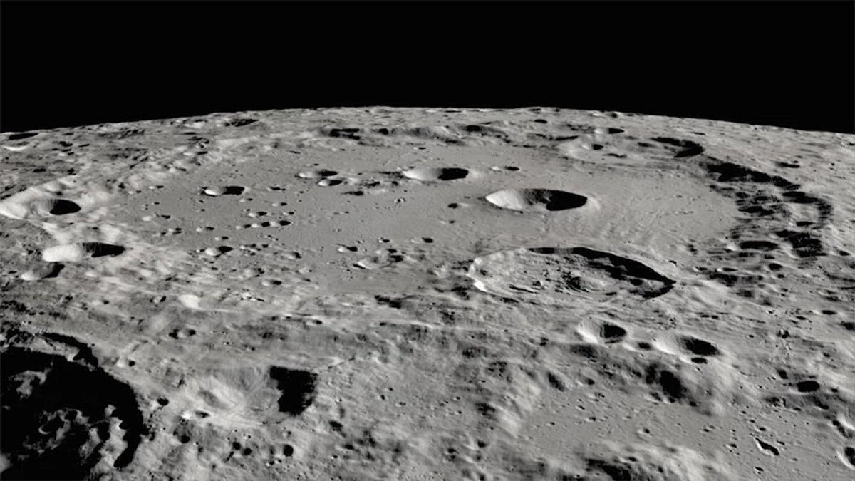 A solar wind-derived water reservoir on the Moon hosted by impact
