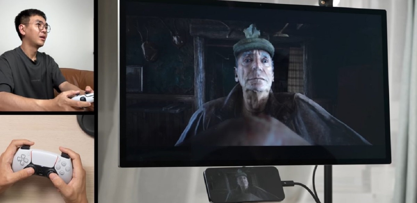 Gamer plays Resident Evil with an iPhone 15 Pro, external monitor and a